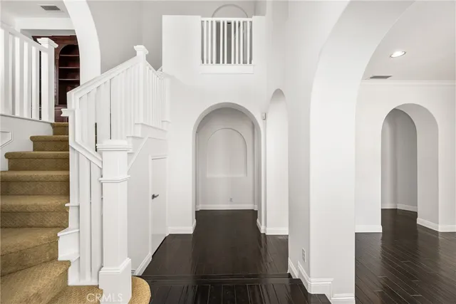 a spacious bathroom with a granite countertop sink mirror and