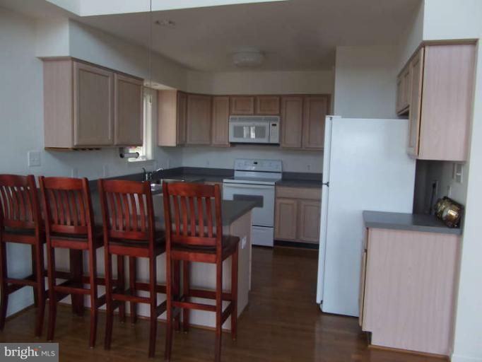 1067 Shore Acres Road Arnold, MD 21012 - Photo 7 of 22 open to living area, deck and view