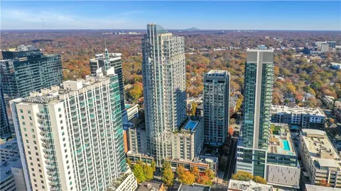a view of a city with tall buildings