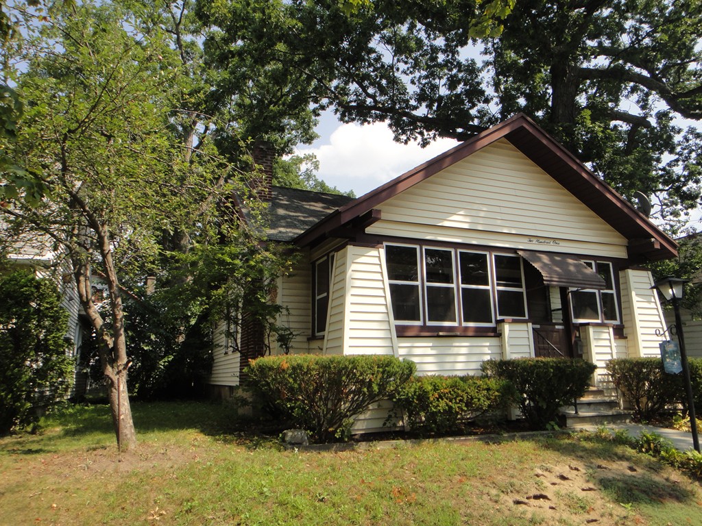 201 Marsden Street Springfield, MA 01109 - Photo 1 of 24 a front view of a house with a yard