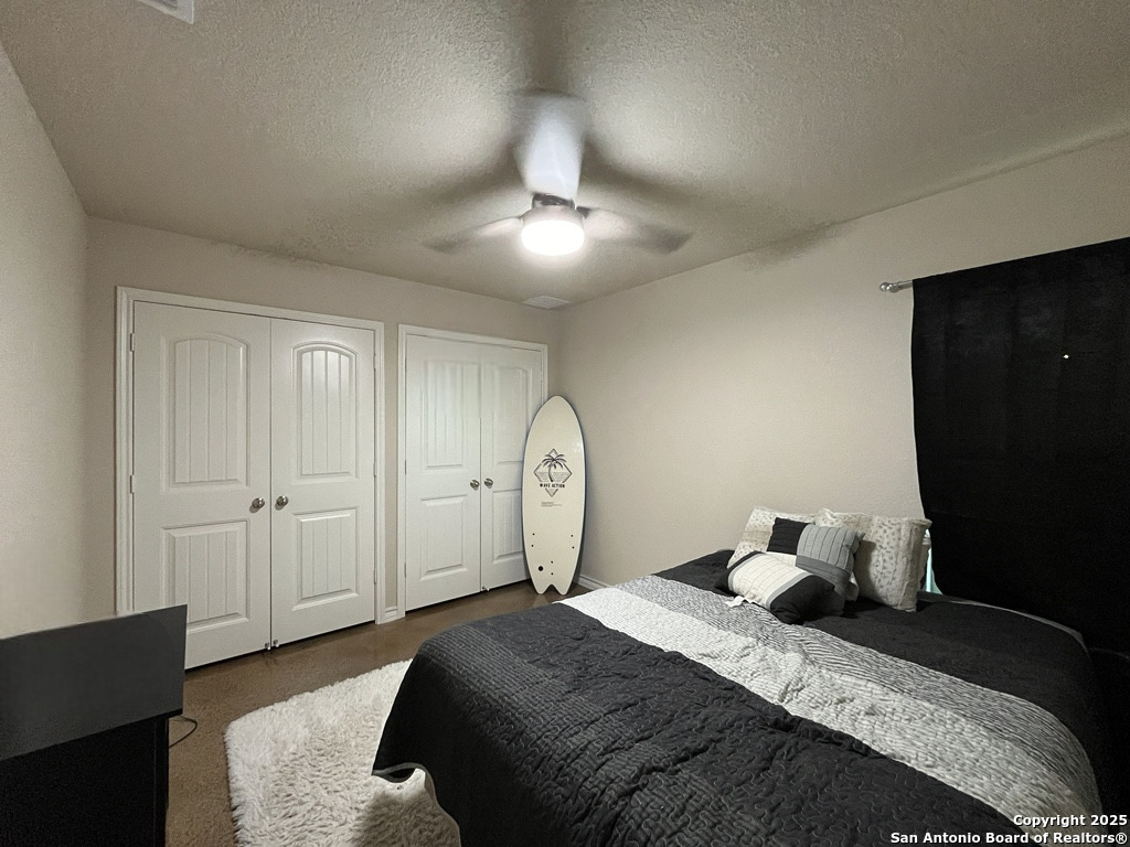 2708 Golf Drive Spring Branch, TX 78070 - Photo 15 of 31 a bedroom with bed and a closet