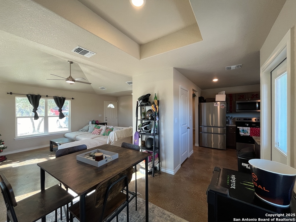 2708 Golf Drive Spring Branch, TX 78070 - Photo 7 of 31 a living room with lots of furniture and kitchen view