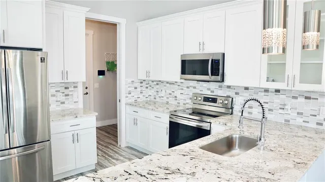a bathroom with a bathtub and a toilet