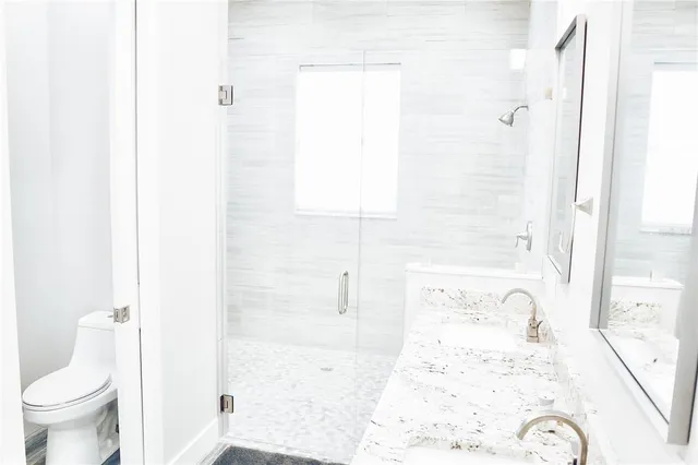 a view of livingroom with furniture and window