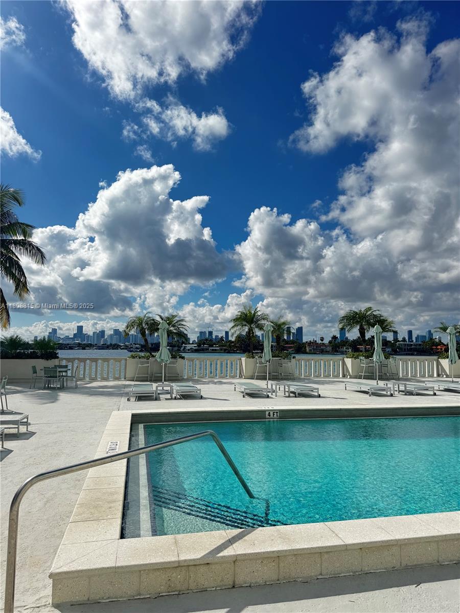 5 Island Avenue, Unit 4E Miami Beach, FL 33139 - Photo 1 of 23 a view of a swimming pool and lake view