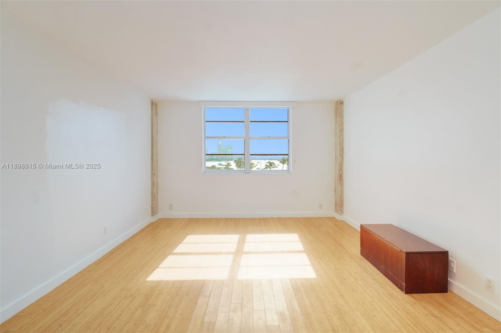 5 Island Avenue, Unit 4E Miami Beach, FL 33139 - Photo 18 of 23 a view of an empty room with a window