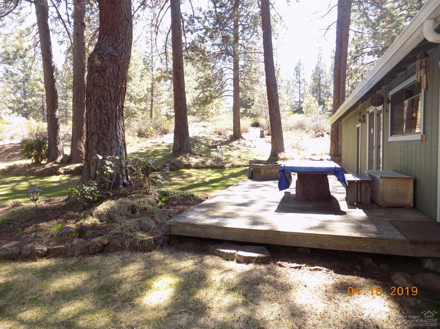 18853 Shoshone Road Bend, OR 97702 - Photo 11 of 25 Back deck and view towards the second ta