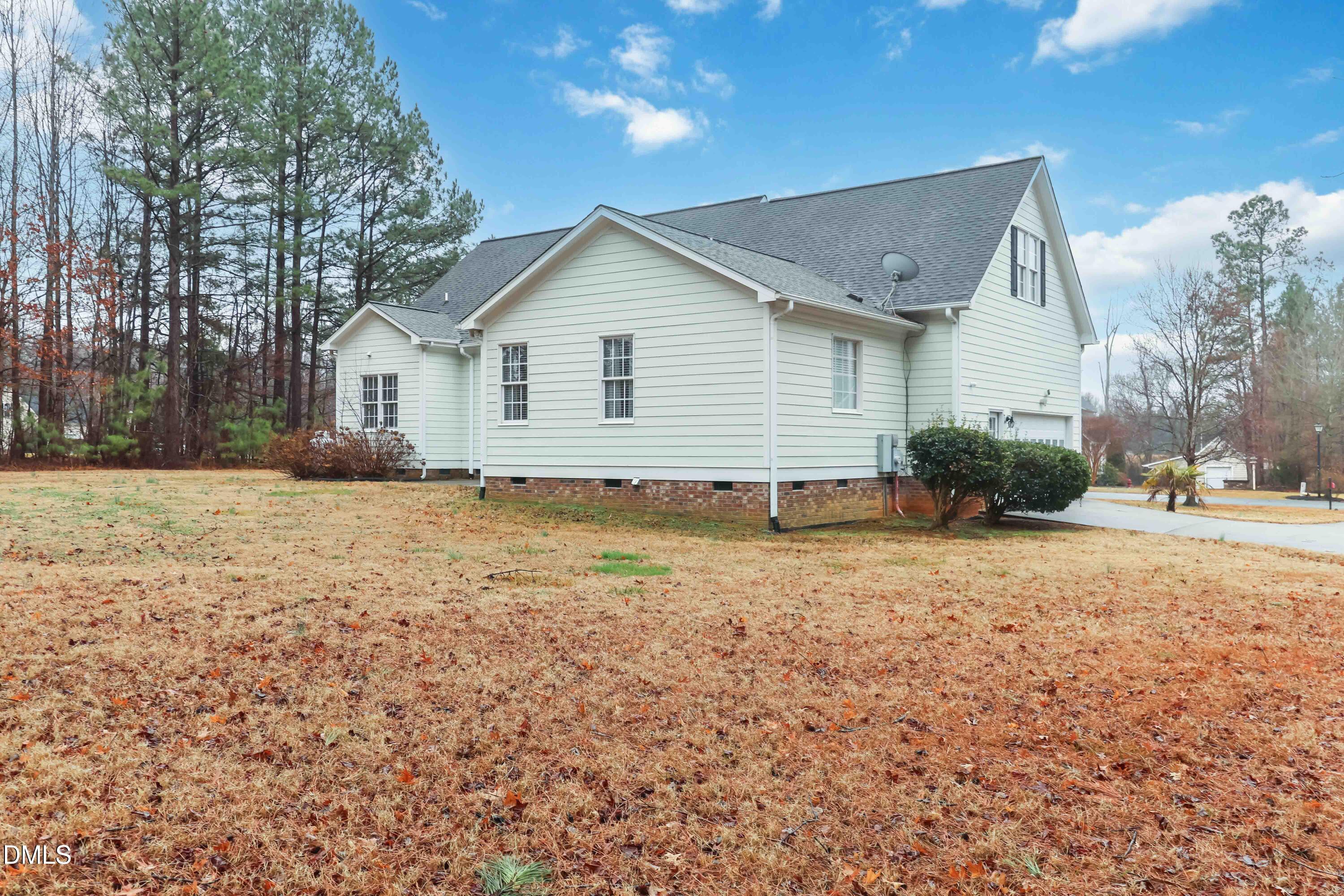 226 Fletcher Ridge Road Timberlake, NC 27583 - Photo 28 of 30 a house view with backyard space
