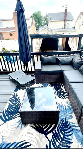 a close view of roof deck with furniture