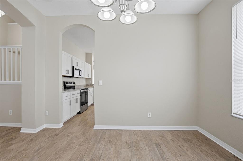 27001 Arrowbrook Way Wesley Chapel, FL 33544 - Photo 18 of 44 a view of kitchen with wooden floor