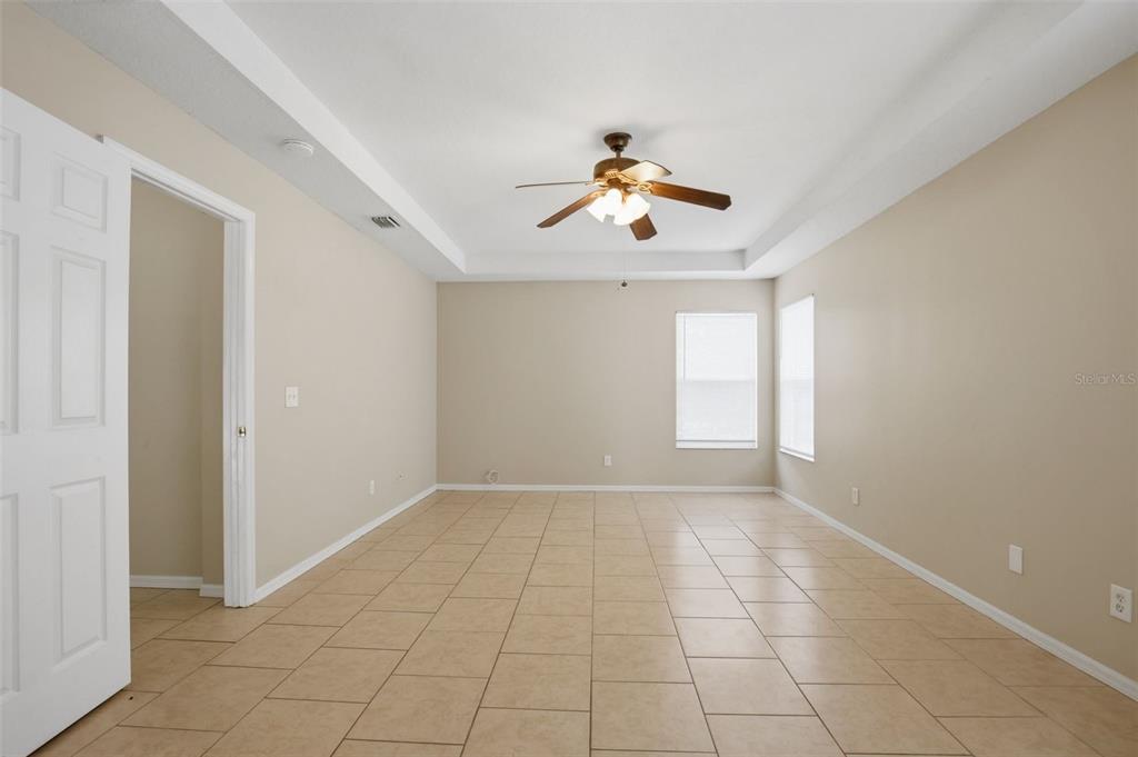 27001 Arrowbrook Way Wesley Chapel, FL 33544 - Photo 24 of 44 wooden floor in an empty room with a window