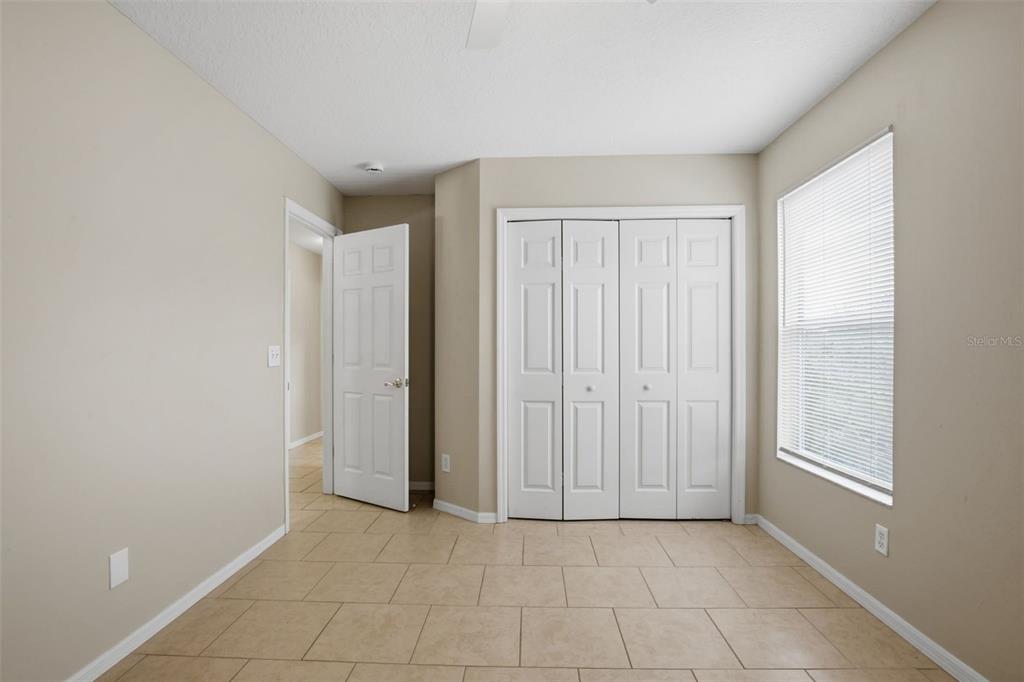 27001 Arrowbrook Way Wesley Chapel, FL 33544 - Photo 33 of 44 an empty room with windows