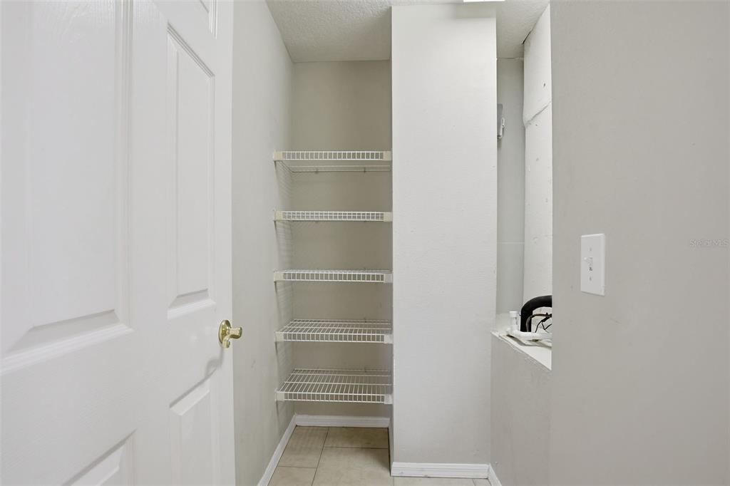 27001 Arrowbrook Way Wesley Chapel, FL 33544 - Photo 35 of 44 a view of walk in closet with empty racks