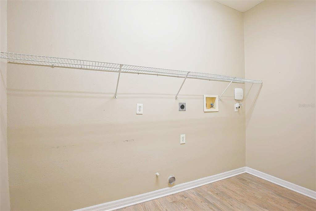 27001 Arrowbrook Way Wesley Chapel, FL 33544 - Photo 41 of 44 a view of a room with racks on the wall