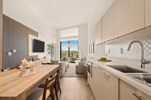 a view of a dining room and livingroom
