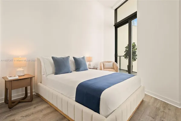 a view of a balcony with wooden floor