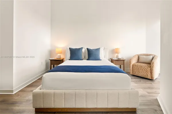 a view of a patio with a table and chairs