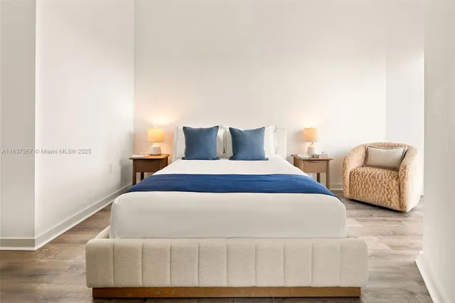 a view of a patio with a table and chairs