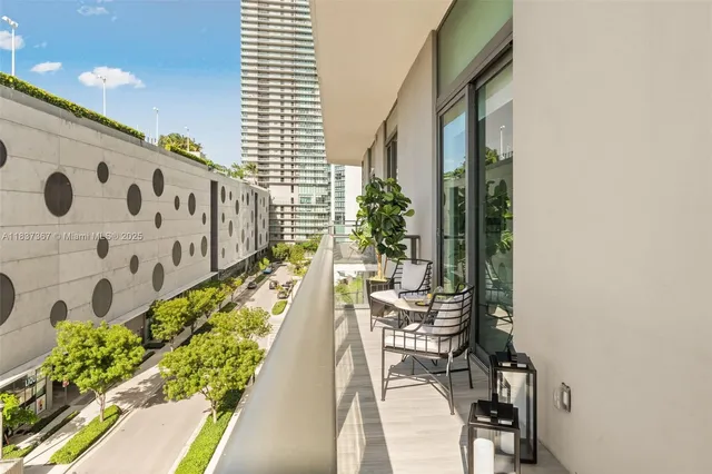 a swimming pool with outdoor seating and yard