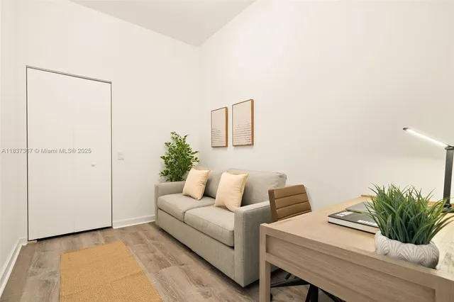 a view of a living room and dining room