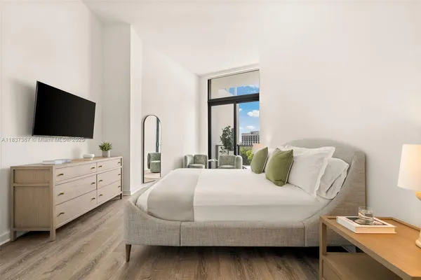 a kitchen with a table and chairs in it