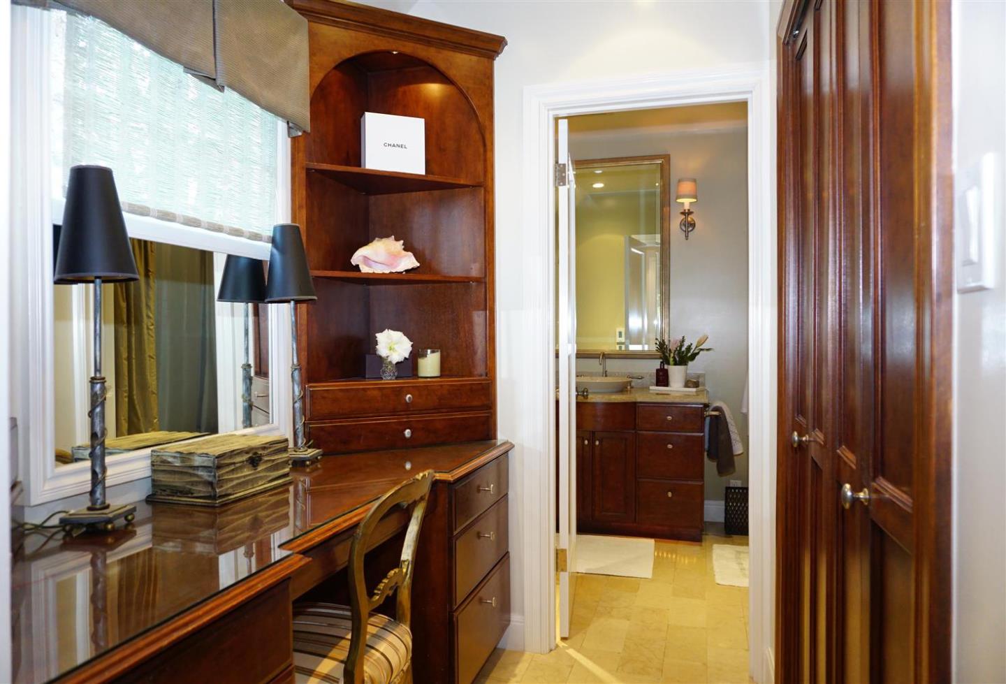 440 Edgewood Road San Mateo, CA 94402 - Photo 22 of 39 a bathroom with a sink and a mirror