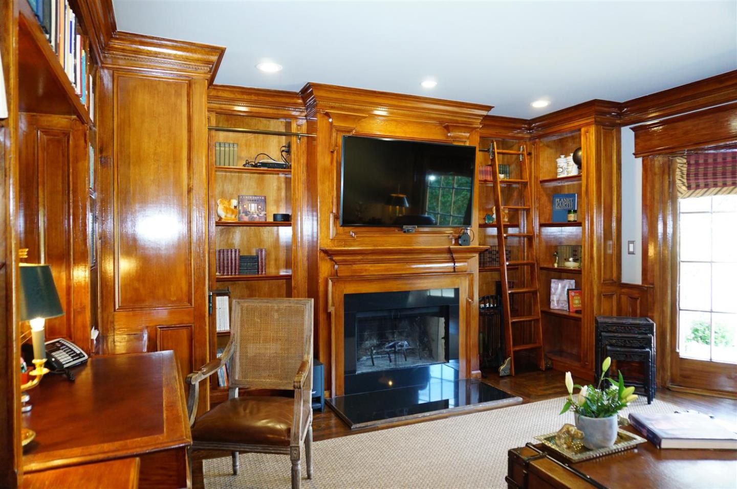 440 Edgewood Road San Mateo, CA 94402 - Photo 24 of 39 a living room with furniture and a fireplace