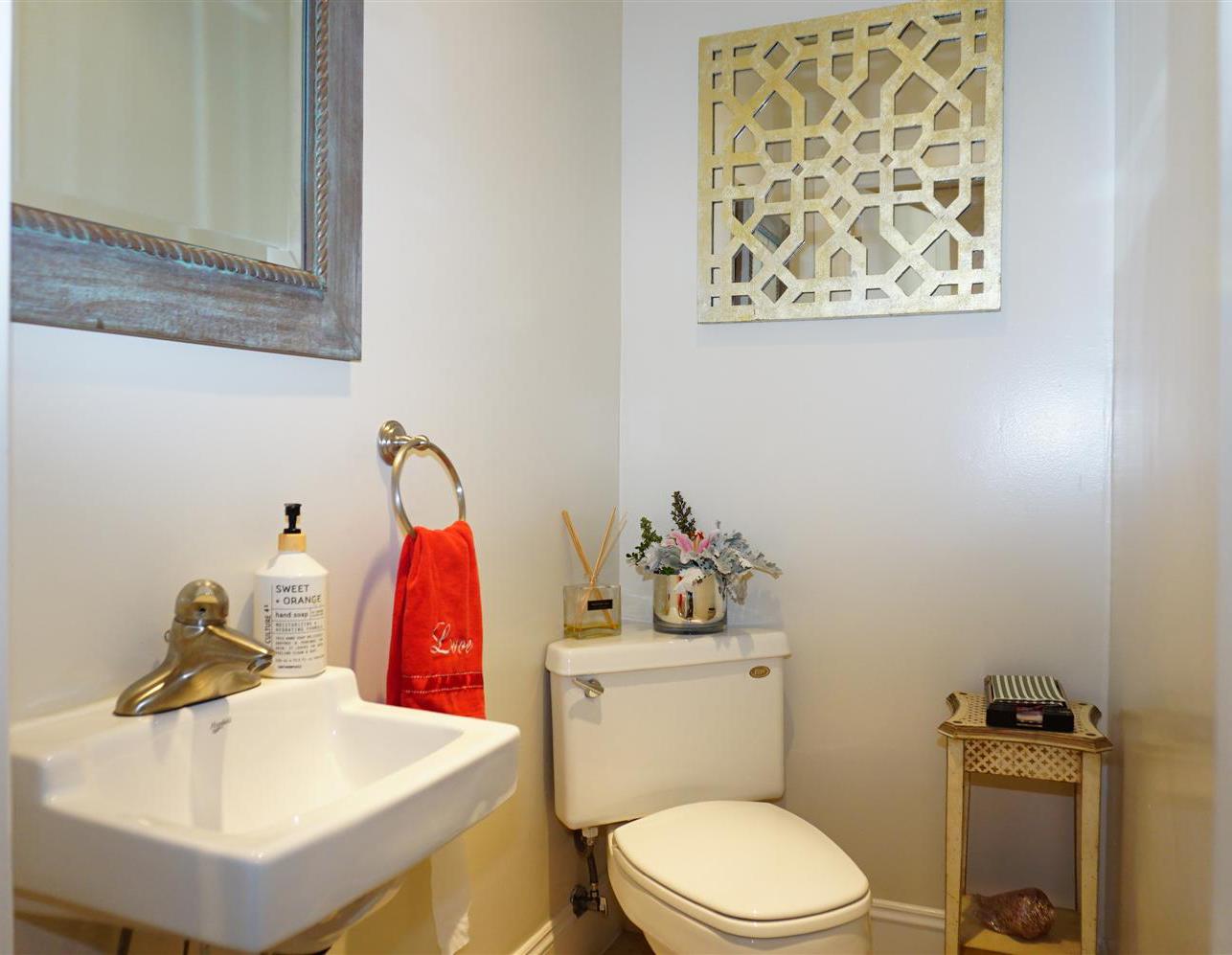 440 Edgewood Road San Mateo, CA 94402 - Photo 26 of 39 a bathroom with a sink mirror and toilet