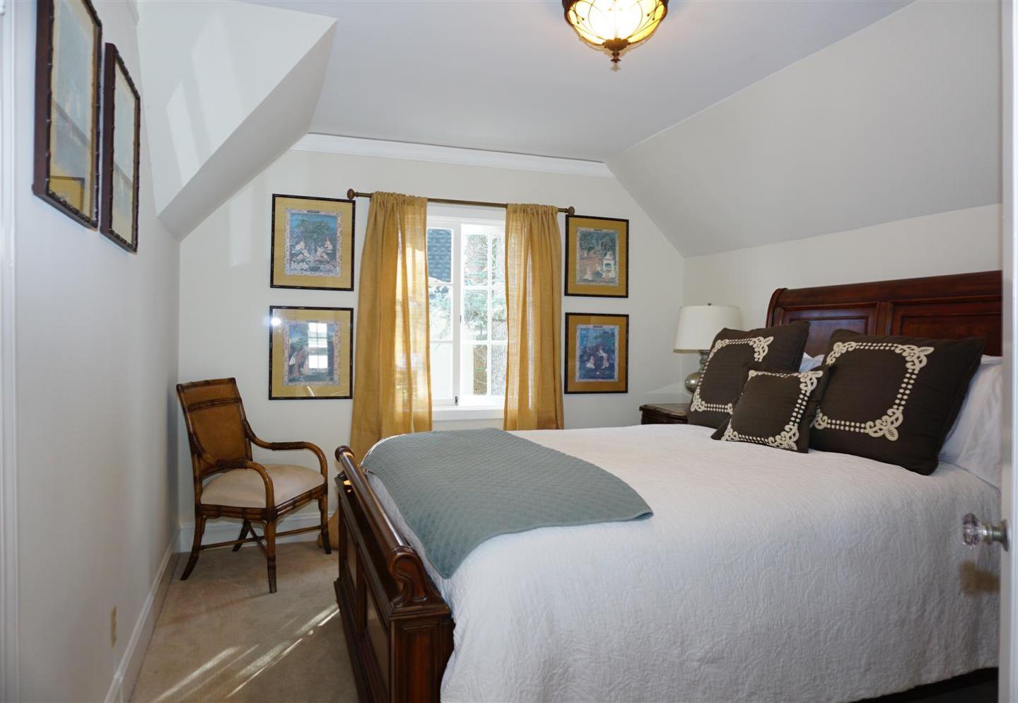 440 Edgewood Road San Mateo, CA 94402 - Photo 27 of 39 a bedroom with a bed and a window