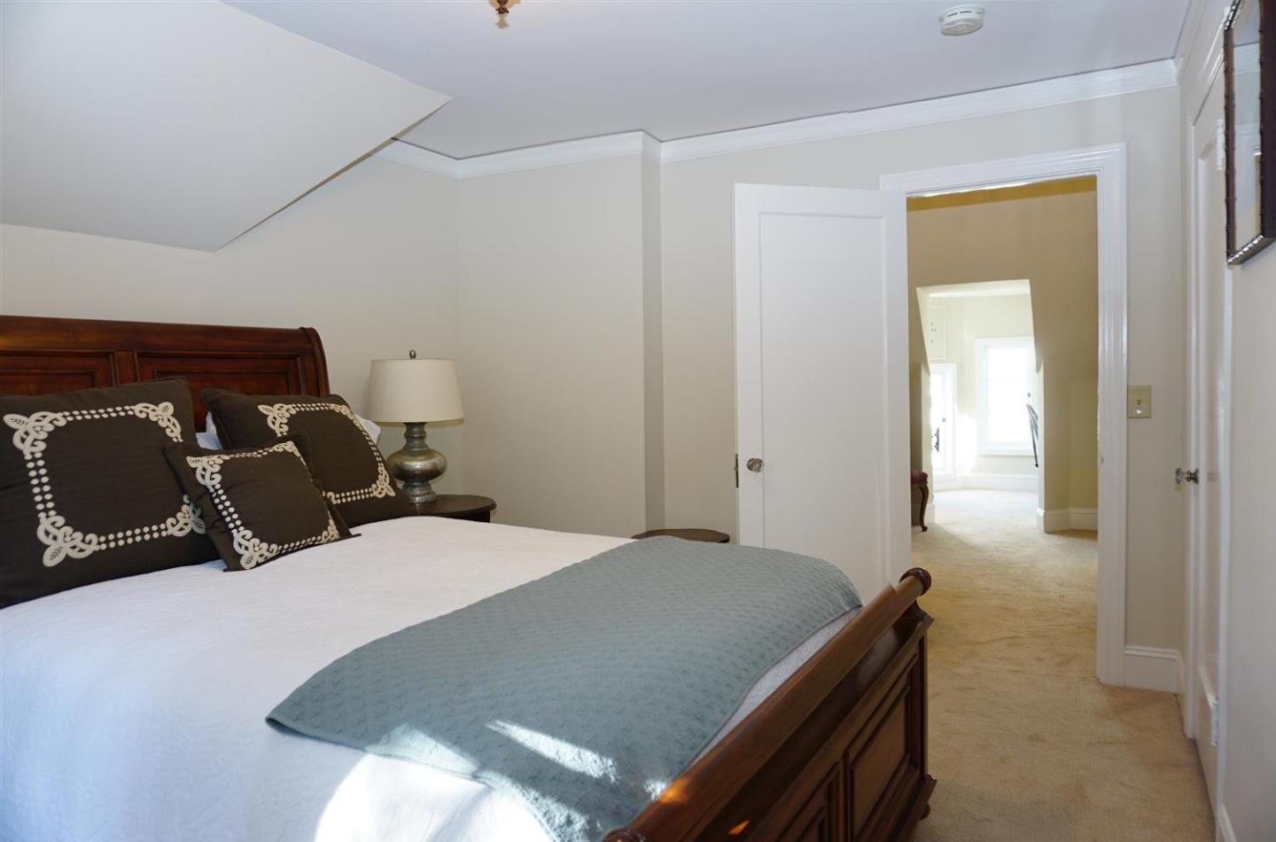 440 Edgewood Road San Mateo, CA 94402 - Photo 28 of 39 a bedroom with bed and window