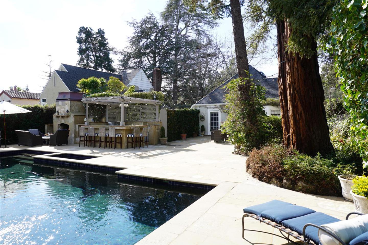 440 Edgewood Road San Mateo, CA 94402 - Photo 36 of 39 a view of a house with swimming pool and sitting area