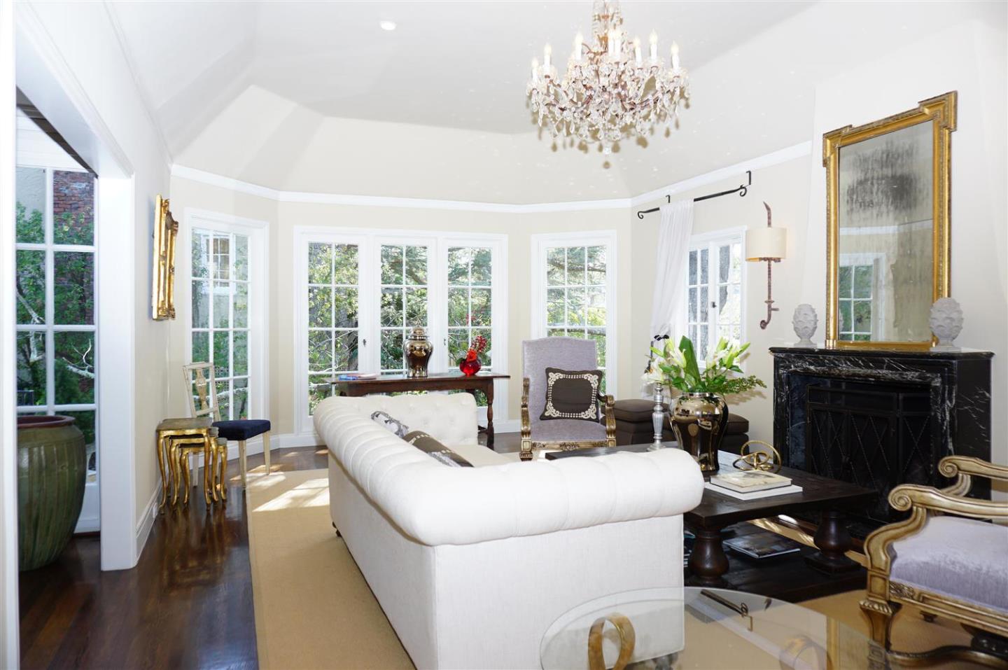 440 Edgewood Road San Mateo, CA 94402 - Photo 9 of 39 a living room with furniture and a fireplace