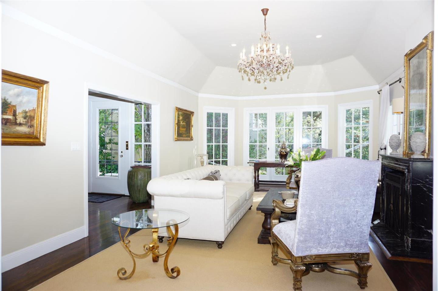 440 Edgewood Road San Mateo, CA 94402 - Photo 10 of 39 a living room with furniture and a chandelier