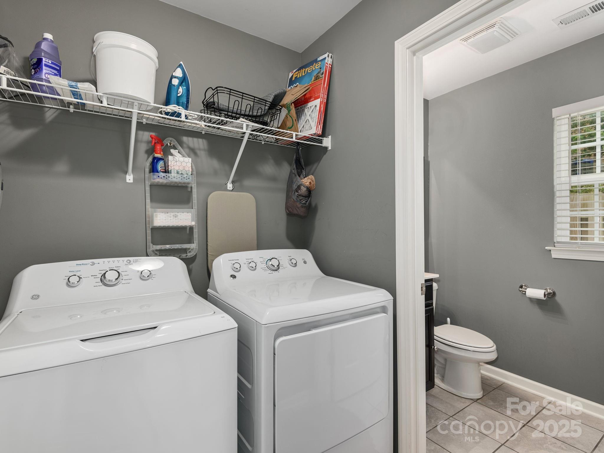 158 Alpine Ridge Drive Asheville, NC 28803 - Photo 13 of 18 a utility room with dryer and washer