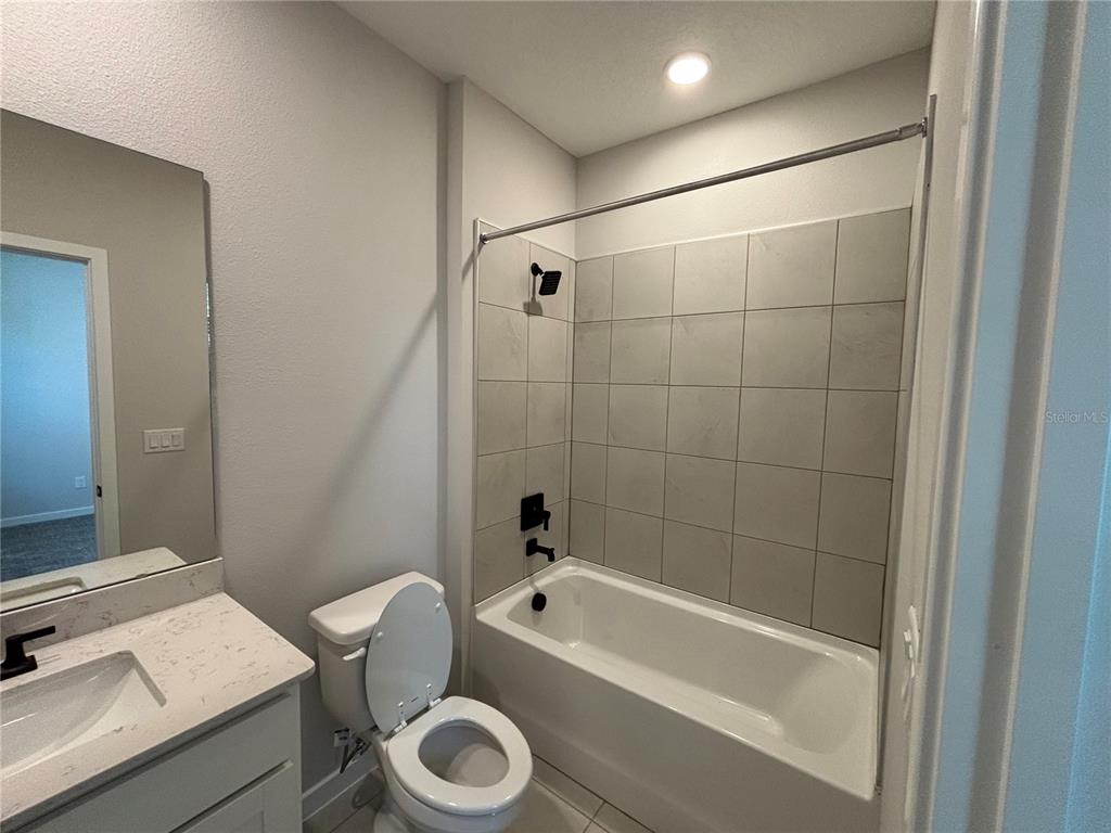 63 Pegasus Road Flagler Beach, FL 32136 - Photo 18 of 35 a bathroom with a sink a toilet and a bathtub
