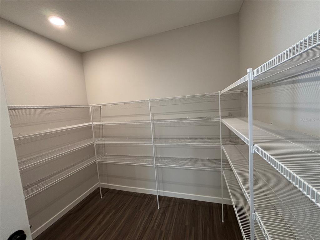 63 Pegasus Road Flagler Beach, FL 32136 - Photo 25 of 35 a view of walk in closet with empty racks