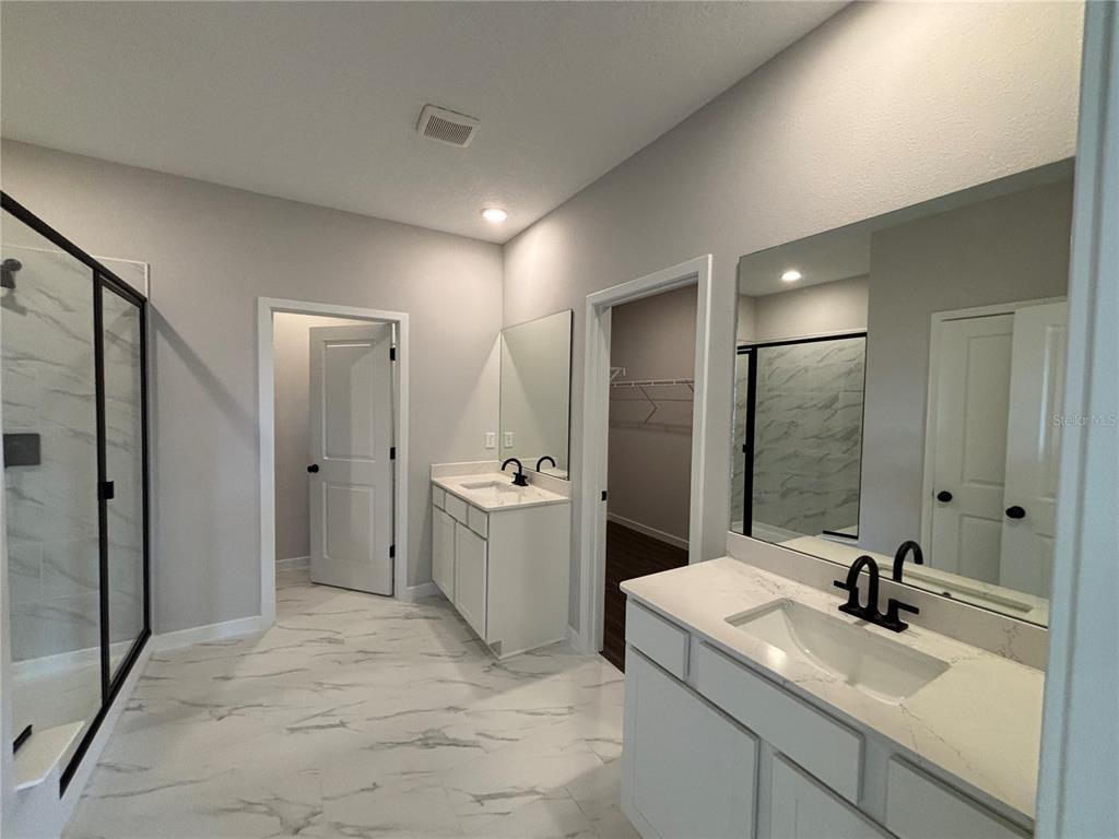 63 Pegasus Road Flagler Beach, FL 32136 - Photo 28 of 35 a bathroom with a sink and a mirror