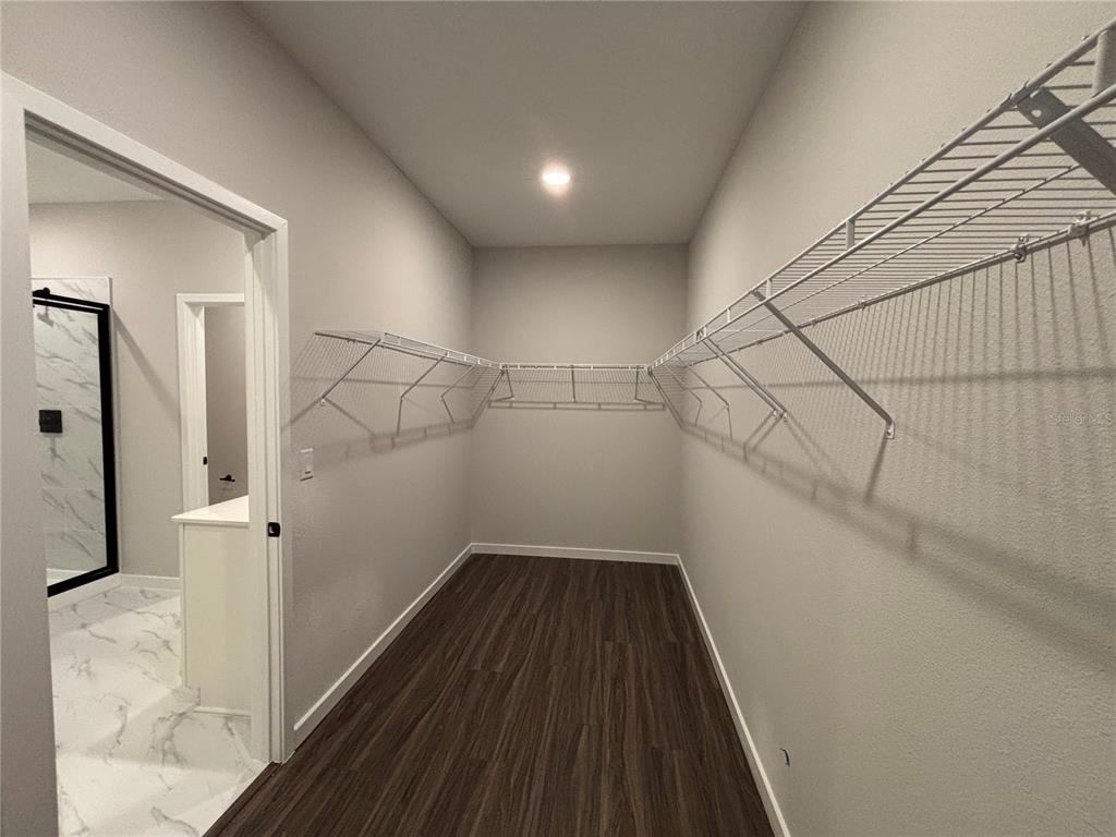 63 Pegasus Road Flagler Beach, FL 32136 - Photo 30 of 35 a view of a room with wooden floor