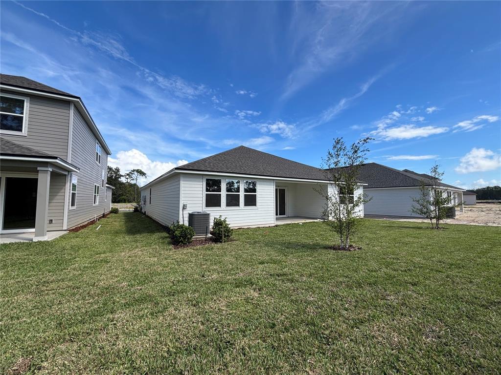 63 Pegasus Road Flagler Beach, FL 32136 - Photo 35 of 35 a house view with a outdoor space