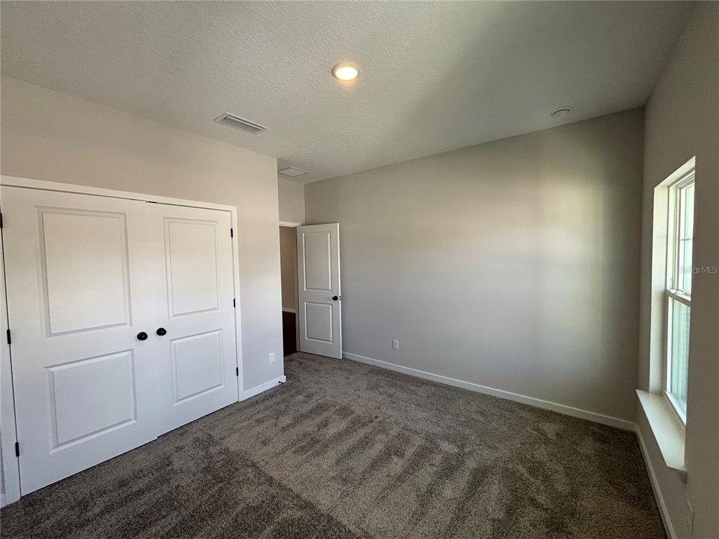 63 Pegasus Road Flagler Beach, FL 32136 - Photo 10 of 35 a view of an empty room and window