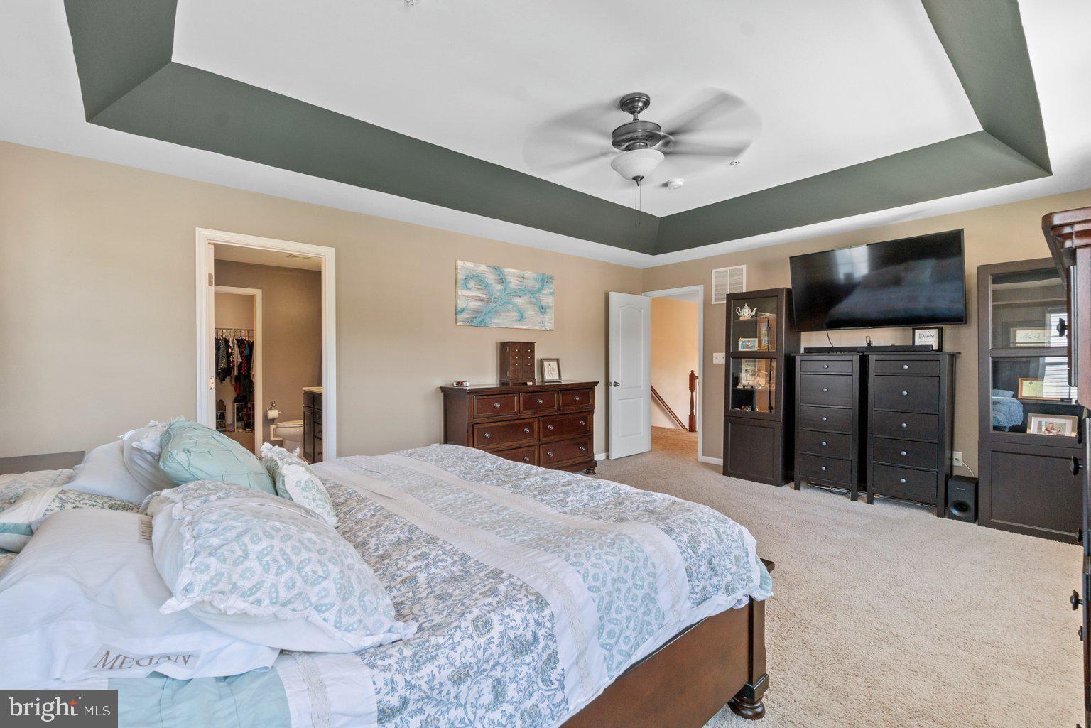900 McCune Road Middle River, MD 21220 - Photo 26 of 55 a bedroom with a large bed and a chandelier