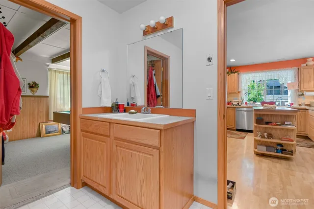 a bathroom with a sink and a mirror