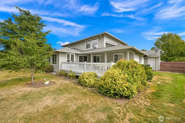 a view of porch with wooden floor