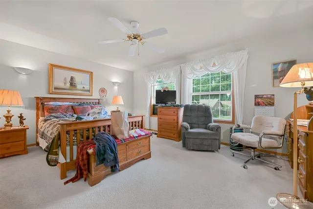 a bedroom with furniture and a couch