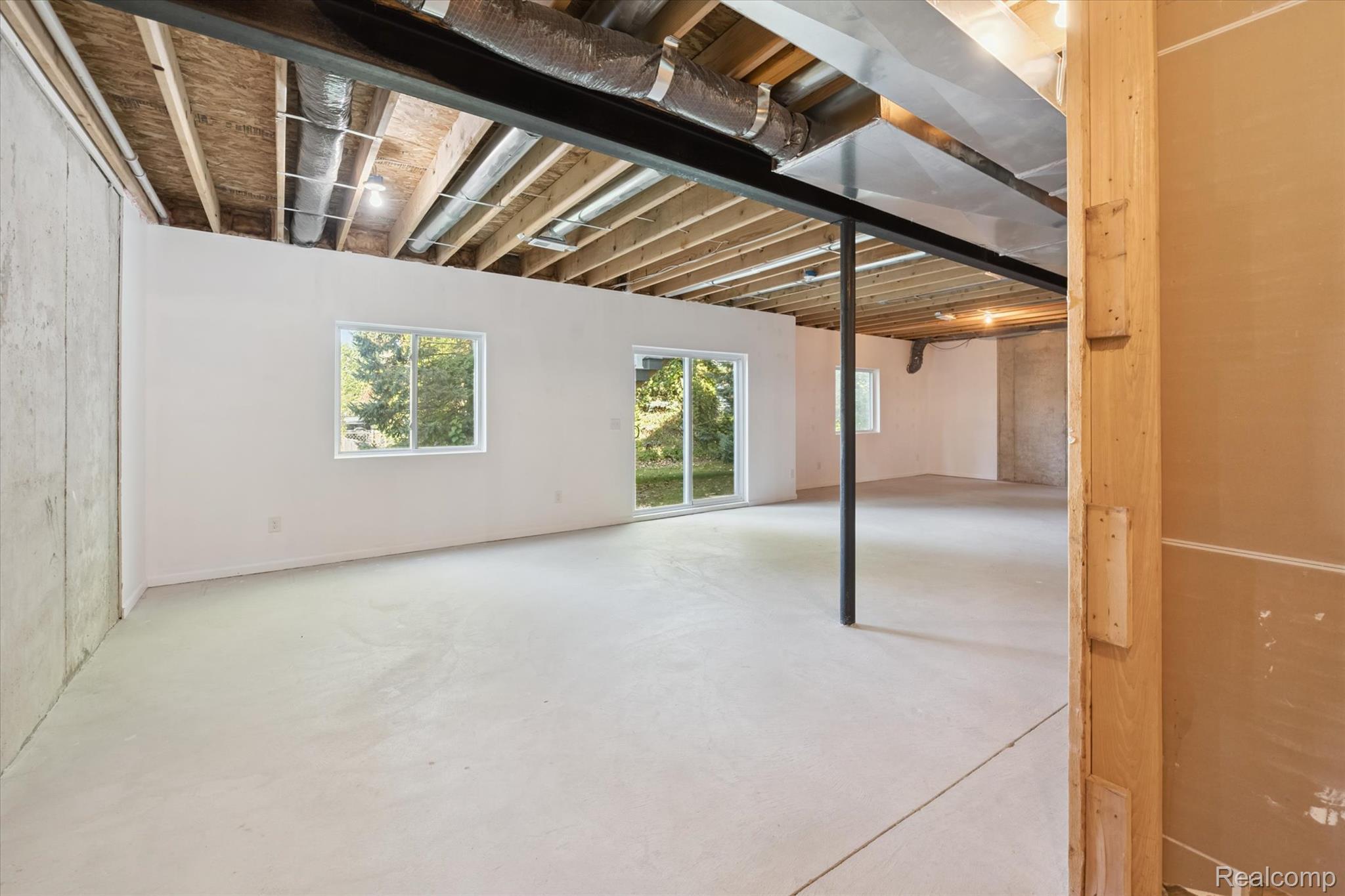 816 Nelson's Ridge Drive Howell, MI 48843 - Photo 23 of 36 Walk-out basement with ample space for recreation, fitness, or additional living areas.