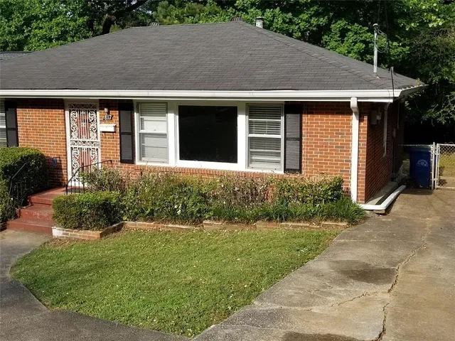a view of a house with garden