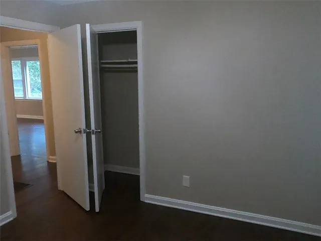 a view of small space with wooden floor