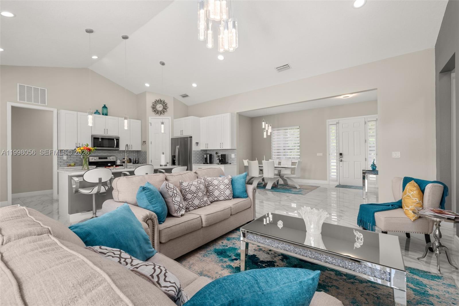 2009 Flower Sebring, FL 33875 - Photo 13 of 61 a living room with furniture and view of kitchen