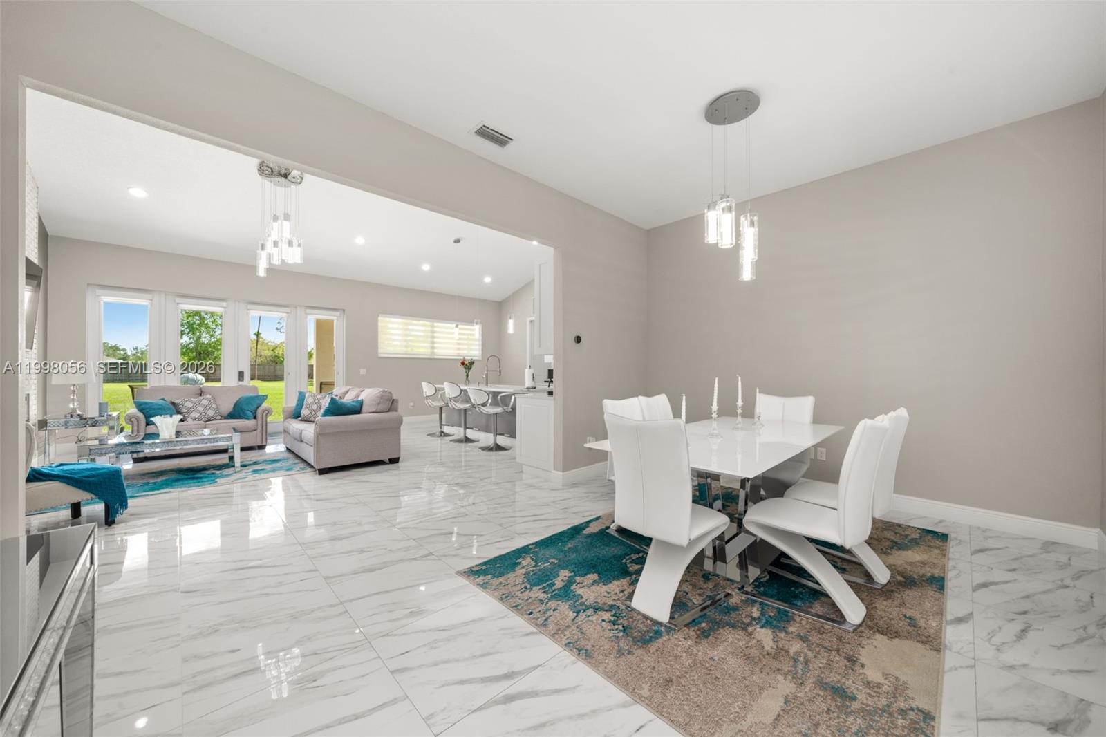 2009 Flower Sebring, FL 33875 - Photo 19 of 61 a living room with furniture and view of kitchen