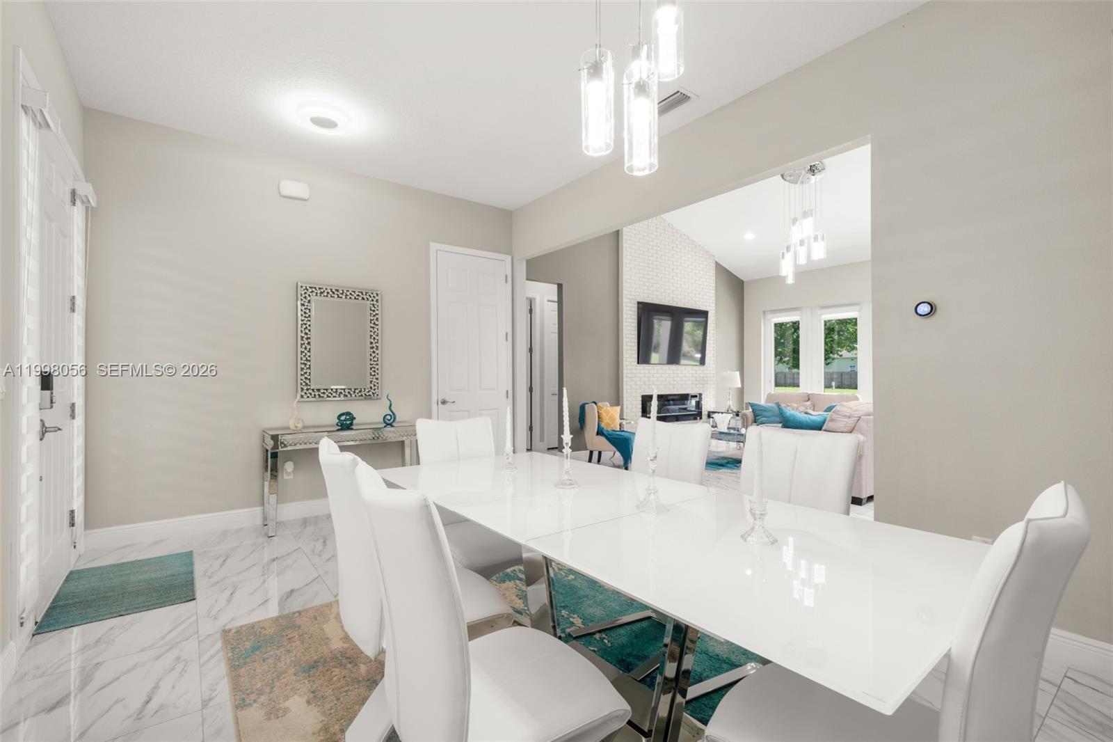 2009 Flower Sebring, FL 33875 - Photo 20 of 61 a view of a dining room with furniture